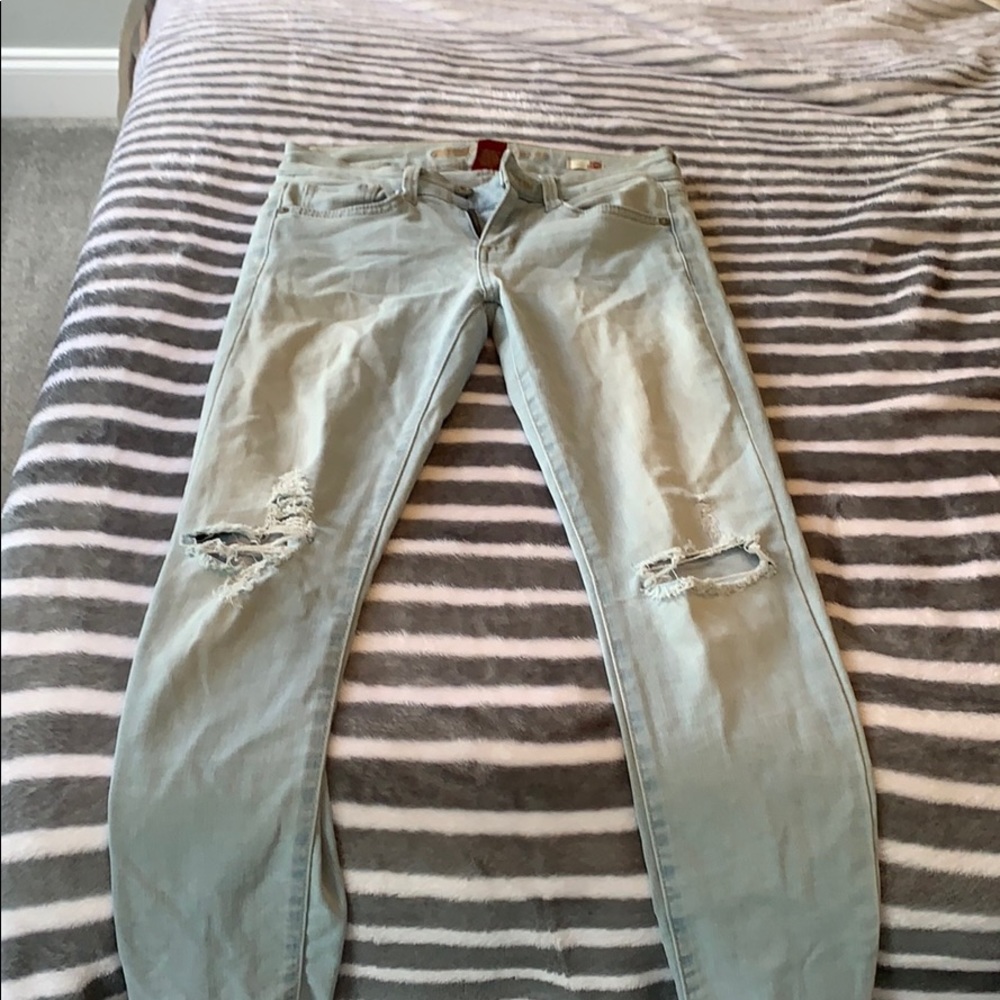 ripped washed super skinny jeans